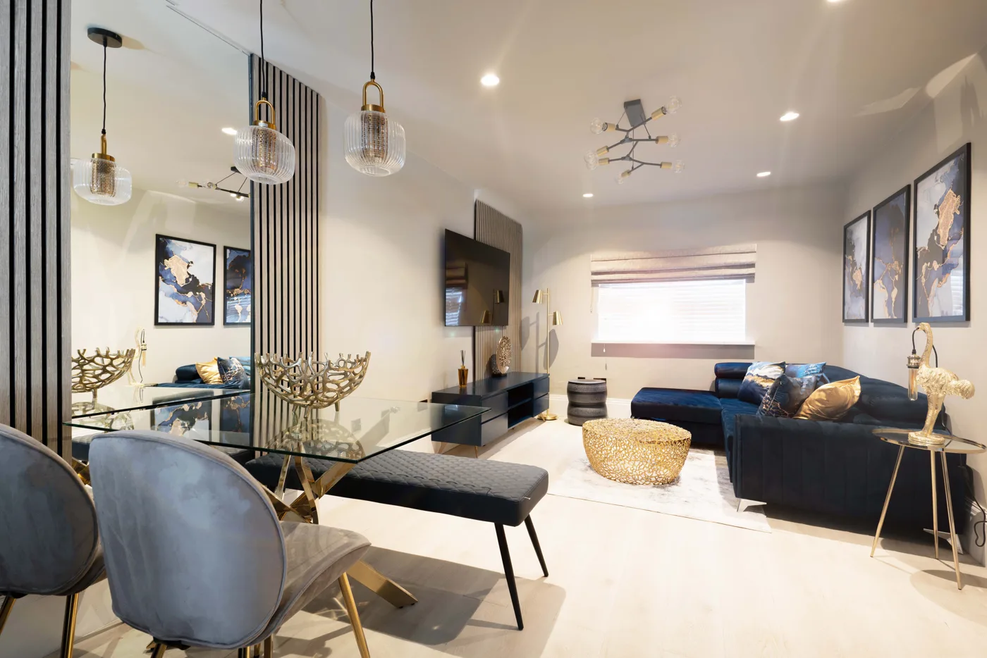 Open-plan living and dining room in a property marketed by Dwelling & Manor